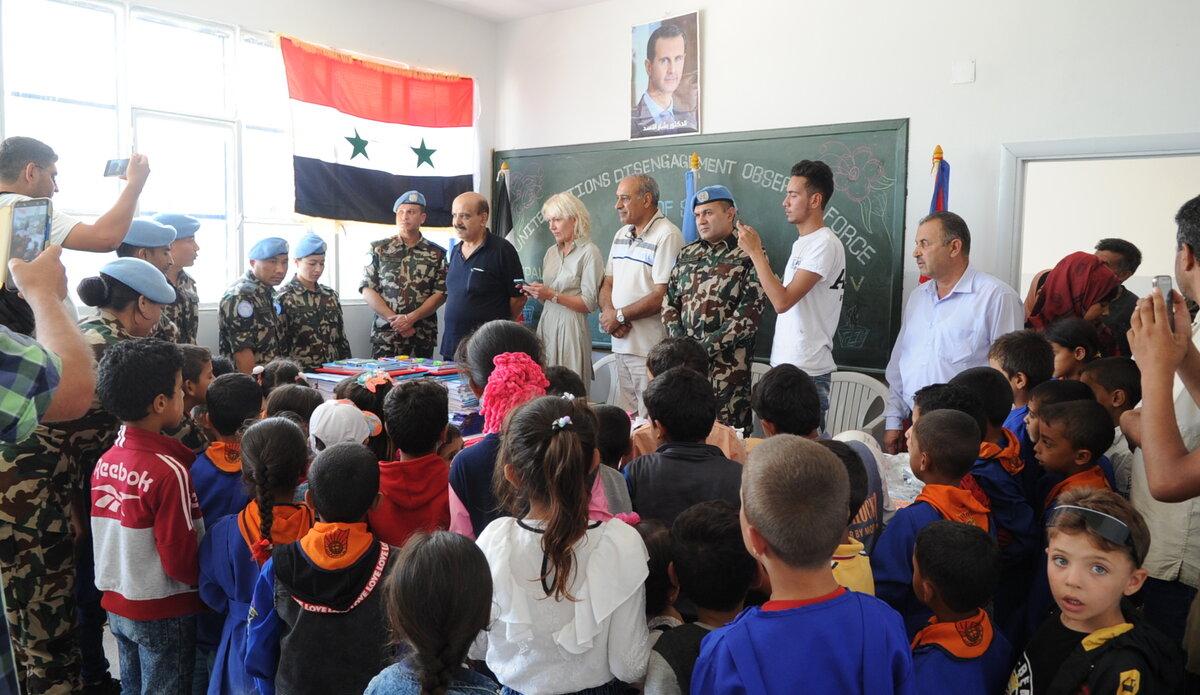 NMC troops distributed school supplies to the children