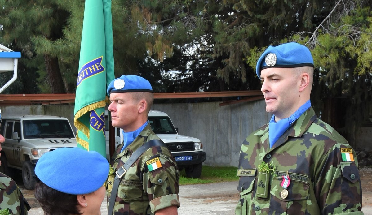 A/FC Brig Gen M O Brien presents Pte McMahon with his UNDOF Medal and Shamrock