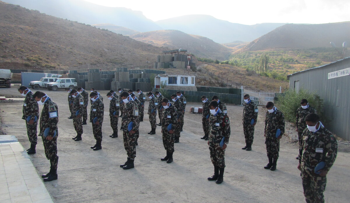 Nepalese Contingent in UNPs 12 and 12A observing the minute's silence