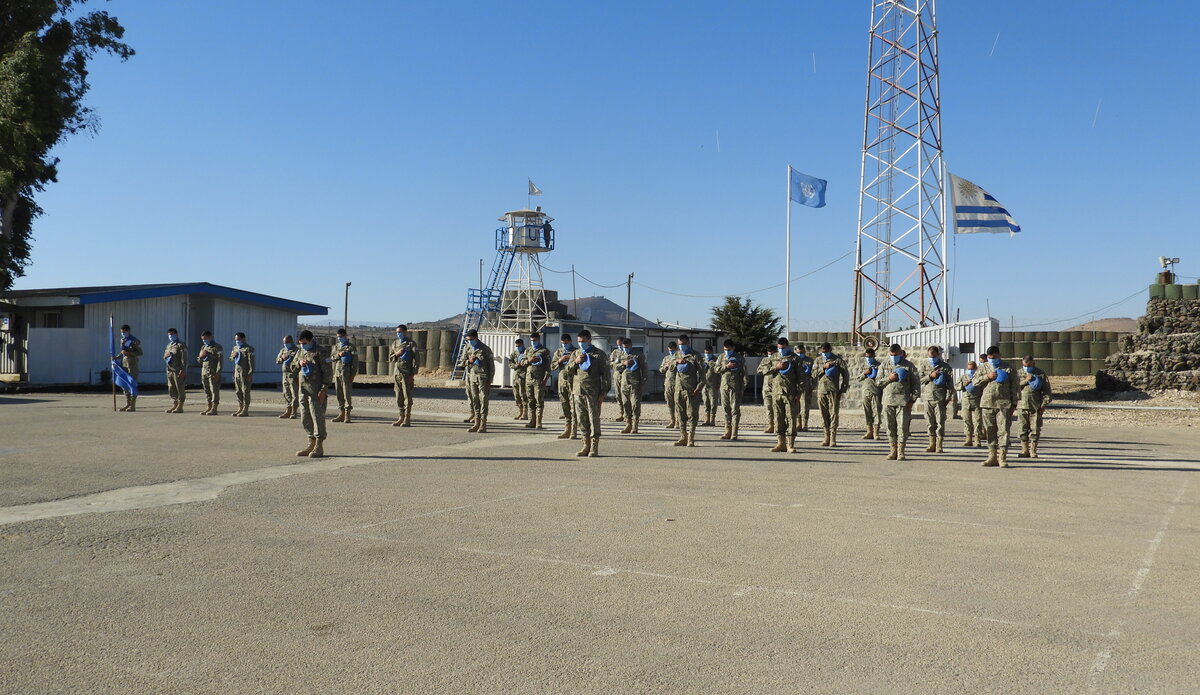 Uruguayan Mechanised Infantry Company in UNP 80 observing the minute's silence