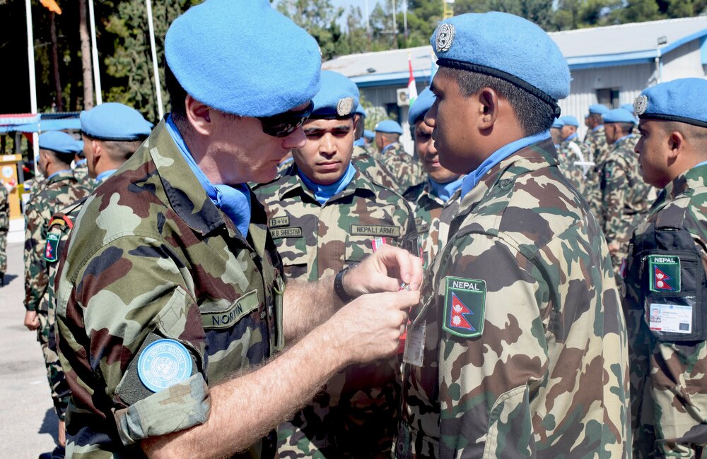 UNDOF Chief Operation Officer Presenting UN Medals 