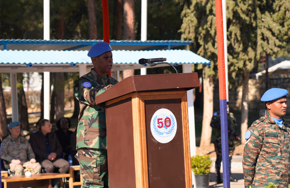 HoM and FC Maj Gen Anita Asmah addressing the parade