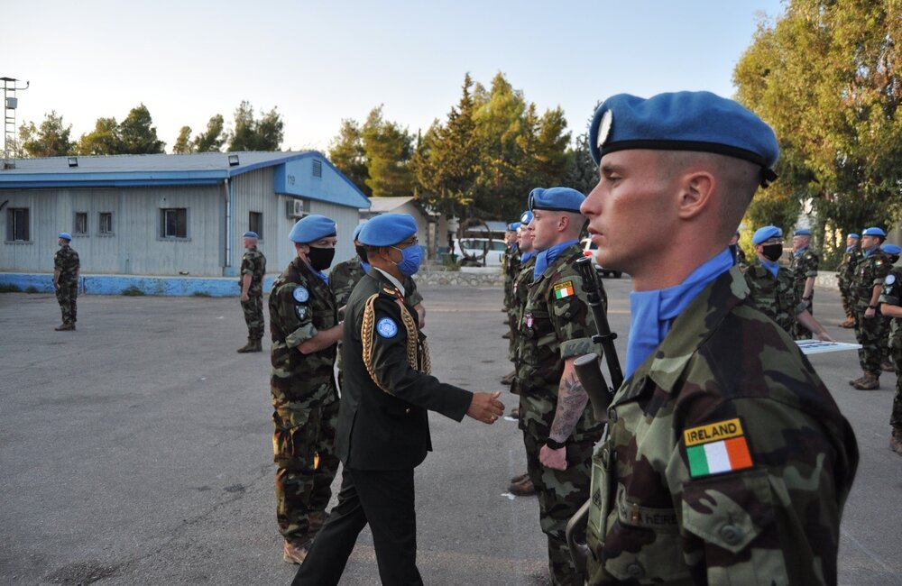 The Force Commander, Maj Gen Ishwar Hamal, presenting UN medals to the Irish troops on parade