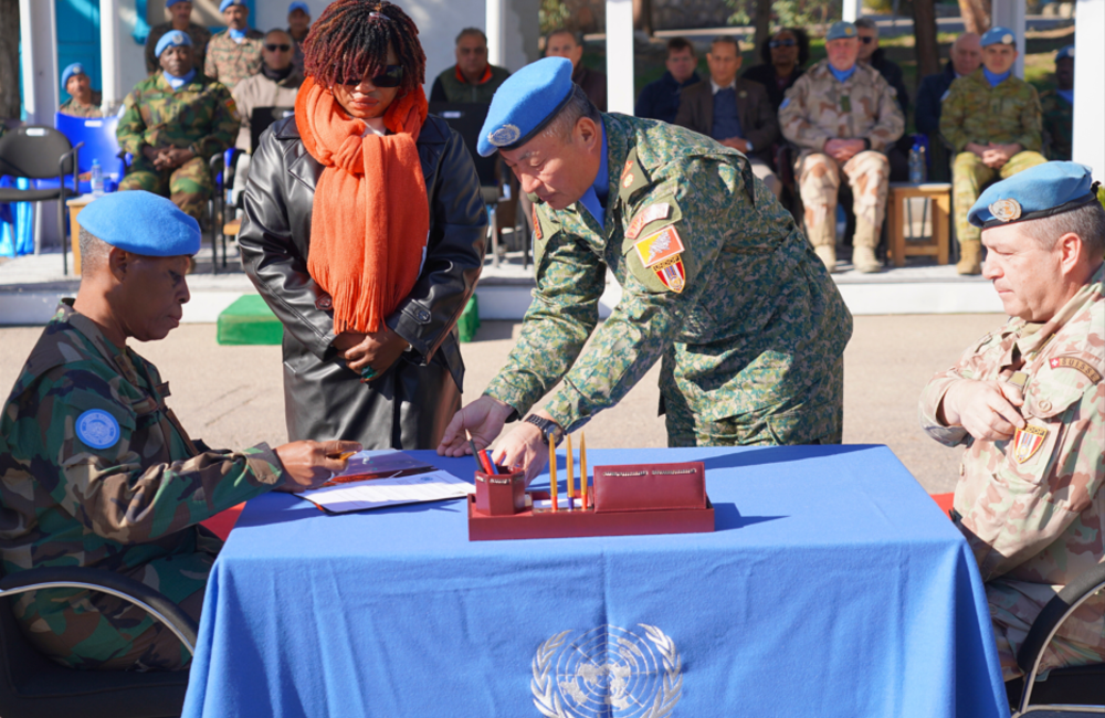 FC signing the transfer of authority documentation